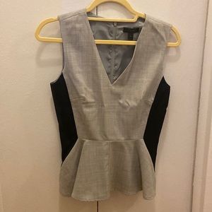 peplum top 100% wool navy and gray.   Brand new with no tags.  Make me an offer
